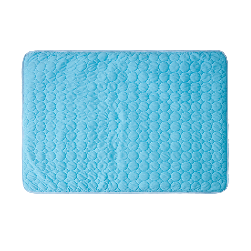 Round pet cooling mat for dogs and cats, summer ice pad, no electricity needed, with blue surface and soft fabric padding.